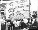 Students march with Franklin School salutes Columbus Day and Italian Americans banner in the Columbus Day Parade