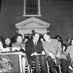 Hubert Humphrey waits to make a speech at a rally