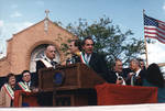 Ace Alagna, Danny Aiello and Robert Guy Torricelli at the podium on the dias of the 1995 Columbus Day Parade