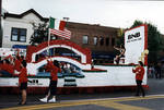 Miss Columbus Day waves from the Broad National Bank float in the 1995 Columbus Day Parade