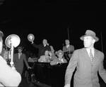Harry S. Truman waves his hat