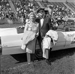 Couple at Grand Marshall's car  at the 1971 Columbus Day Stadium Gala