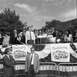 Frankie Avalon presented with a street sign as Congressman Peter W. Rodino Jr., Governor Thomas Kean and others laugh