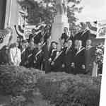Governor Thomas Kean and others pose in front of the Columbus statue during the 1984 Columbus Day Parade