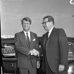 Richard Hughes shakes hands with Robert F. Kennedy