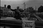 Phil Brito waves his hat in the 1973 Columbus Day Parade