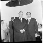 Vice President Hubert Humphrey  poses under an umbrella during 1966 tour of New Jersey