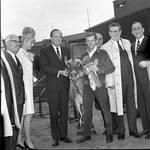 Governore Hughes, Vice President Hubert Humphrey  and others pose with a cow during 1966 tour of New Jersey