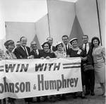 Vice President Hubert Humphrey  and supporters pose with a Win with Johnson &  banner during 1966 tour of New Jersey