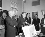 Dwight D. Eisenhower, James P. Mitchell and others by the podium