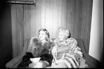 Lorna Luft and friend pose on the sofa