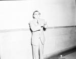 Eddie Cantor standing in the hallway