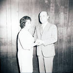 Mrs. Maria Lanza shakes hands