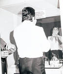 Toni Dalli in the mirror backstage
