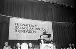 Danny Aiello at National Italian American foundation, standing on stage