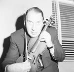 Henny Youngman posed with violin