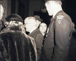 Peter W. Rodino smiles from behind Harry Truman