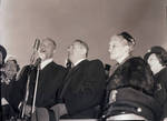 Peter W. Rodino stand next to astronaut John Glenn during a speech