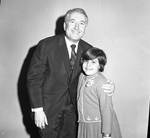 Peter W. Rodino poses with a young girl
