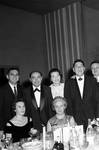 Louis Prima with group at table