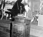 Frankie Avalon standing at a podium