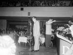 Perry Como on stage at the mic