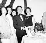 Al Martino and fans showing off his album at Don's 21st