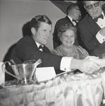 Senator Ted Kennedy shakes hands as Elizabeth ï¿½Bettyï¿½ Murphy Hughes laughs
