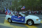 Waving from a car in the 1995 Puerto Rican Parade