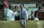 Smiling down from the dais in the 1995 Puerto Rican Parade
