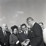 Lady Bird Johnson, Governor Richard Hughes, and President Lyndon B. Johnson during a visit to Liberty Island for signing of the 1965 Immigration Bill