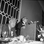 Robert Meyner laughs as Peter Rodino speaks at a North Ward Democratic Country Commission political event at the Robert Treat Hotel, Newark NJ