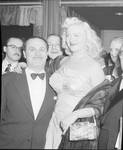 Dagmar poses with a gentleman by Ace (Armando) Alagna, 1925-2000