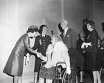 Lady Bird Johnson greets dignitaries by Ace (Armando) Alagna, 1925-2000