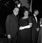 Mrs. Elizabeth Murphy Hughes and priest at reception for Princess Christina of Sweden by Ace (Armando) Alagna, 1925-2000