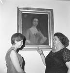 Mrs. Elizabeth Murphy Hughes shows a painting to Princess Christina of Sweden by Ace (Armando) Alagna, 1925-2000
