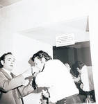 Toni Dalli prepares for a concert by Ace (Armando) Alagna, 1925-2000