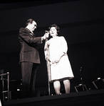 Mrs. Maria Lanza speaking on stage by Ace (Armando) Alagna, 1925-2000