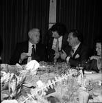 Joe Di Maggio, Ace Alagna with fans at a table by Ace (Armando) Alagna, 1925-2000