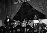 Phil Brito and band on stage during Meadowbrook event by Ace (Armando) Alagna, 1925-2000