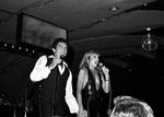 Sergio Franchi on stage with woman singing by Ace (Armando) Alagna, 1925-2000