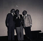 Phil Brito on stage with men by Ace (Armando) Alagna, 1925-2000