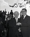 Governor Richard Hughes shakes hands with Michael Musmanno during a visit to Liberty Island for signing of the 1965 Immigration Bill by Ace (Armando) Alagna, 1925-2000
