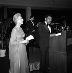 Celeste Holm is introduced at the 1978 Opera Ball, Newark Airport by Ace (Armando) Alagna, 1925-2000
