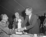 John F. Kennedy gives an award in Spring Lake, N.J. by Ace (Armando) Alagna, 1925-2000