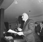 NJ State Senator Gerardo Del Tufo stands in the senate chambers by Ace (Armando) Alagna, 1925-2000