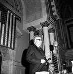 NJ State Assembly member Smith stands in the Assembly chamber by Ace (Armando) Alagna, 1925-2000