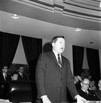 NJ State Senator Joseph C. Woodcock speaks in the Senate chamber by Ace (Armando) Alagna, 1925-2000