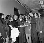 New Jersey State Senator Waldor stands amidst a group of youth, who hold a sign saying, Vote Yes 18: Voting Age Coalition by Ace (Armando) Alagna, 1925-2000