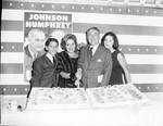 Peter W. Rodino and family cutting a victory cake by Ace (Armando) Alagna, 1925-2000